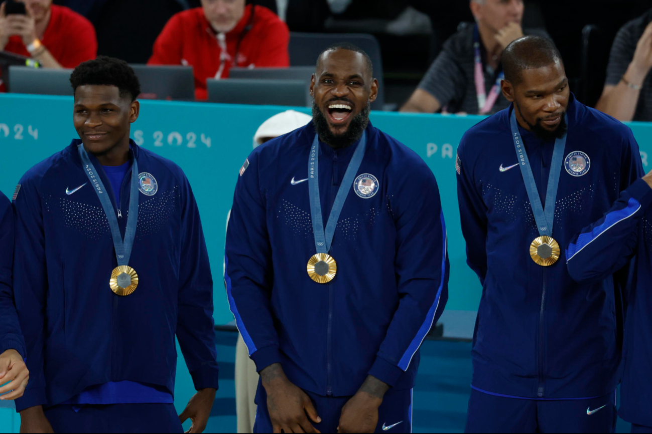 El team USA con su medalla de oro