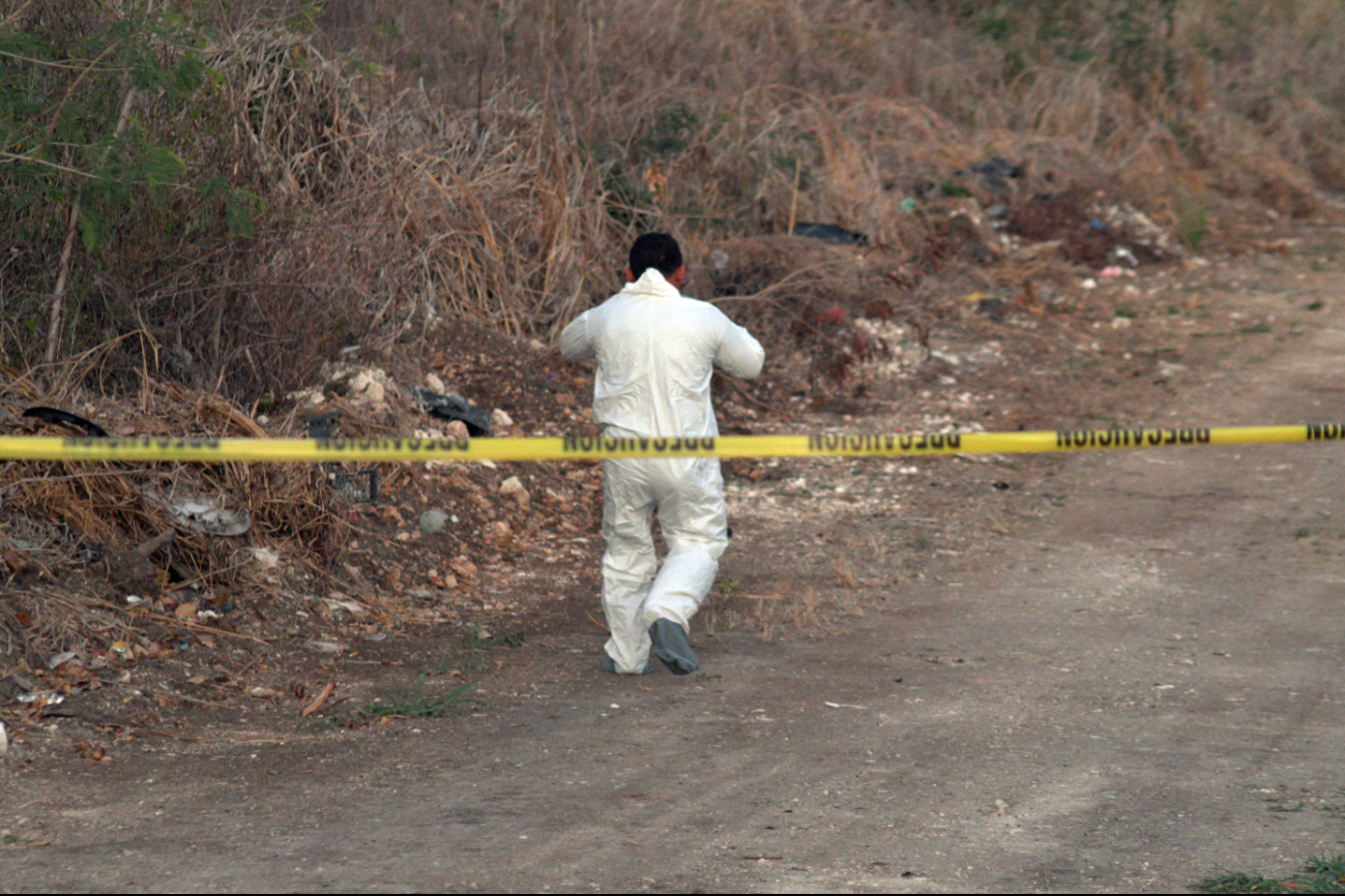  Encuentran a un joven ejecutado    en  Campeche y balean taller al mismo tiempo