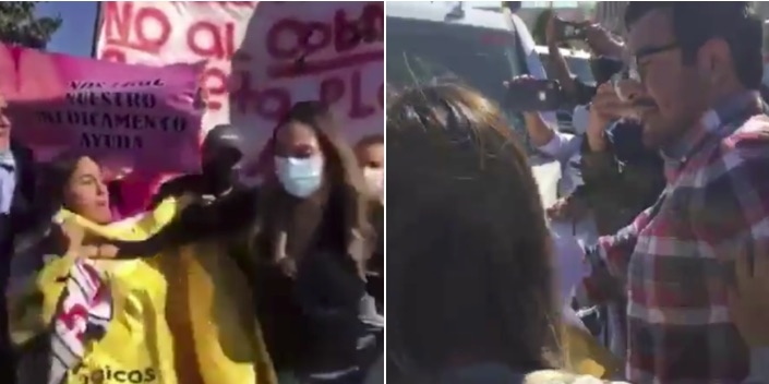 Mujer da cachetada a elemento de seguridad de AMLO; exigía medicamentos para cáncer (Video)