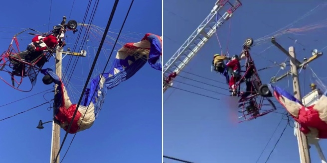 Santa Claus se accidenta en EU; queda atorado en los cables de luz: VIDEO