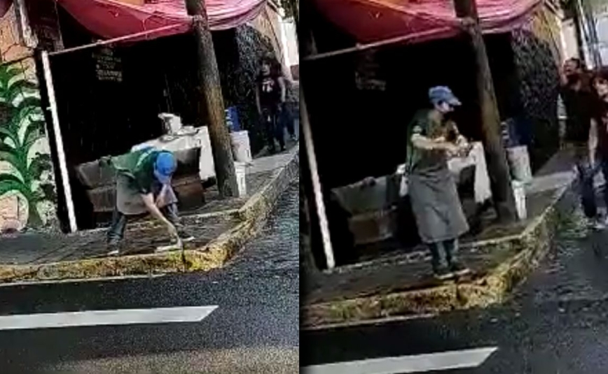 Taquero limpia mesas con agua sucia de un charco en CDMX: VIDEO