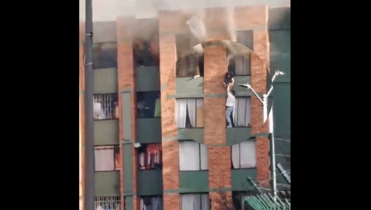 ¡Héroes! Jóvenes rescatan a una joven y a su perro de un incendio en Bogotá: VIDEO